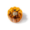 Pumpkin-shaped Godiva chocolate bar on a white background